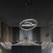 Lampadario Moderno a Sospensione a Forma di Anelli Intrecciati